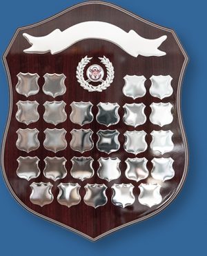 Perpetual woodgrain shield with silver plates