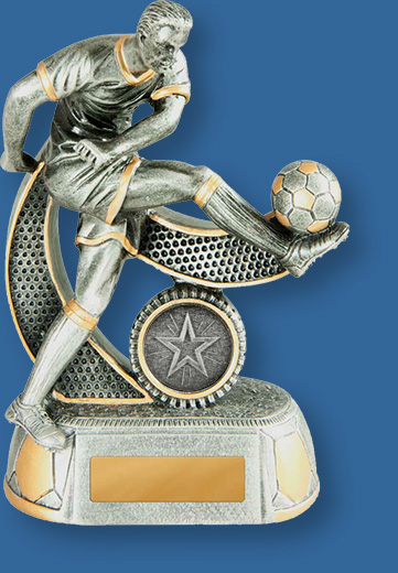 Soccer Trophy Megastar TF#658-9M_e. Grey resin trophy with male soccer player sweep kicking ball in the air.