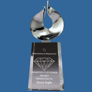 Crystal Clear freestanding Crystal Trophy featuring aesthetic fan shaped chrome design on the top of the crystal award
