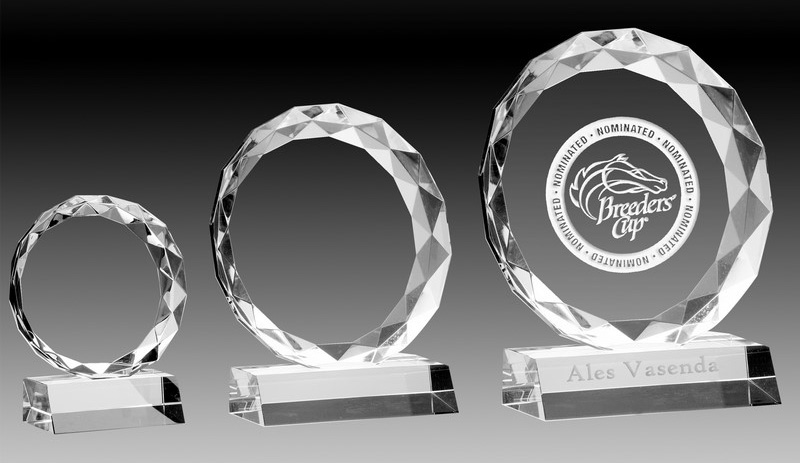 Starburst Crystal Trophies are a circular design two piece style. Faceted edging uses light to beautify the Glass Trophy.