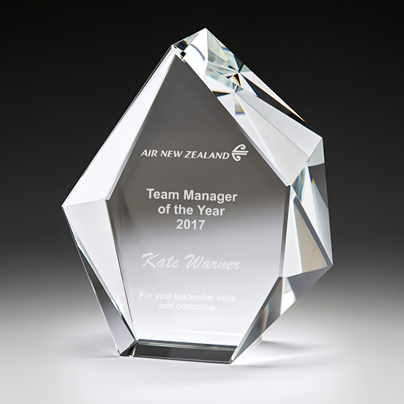 Glacier Optical Crystal Trophy. Very solid freestanding Crystal Award that does not need a base to stand. The clever faceting refracts the light.