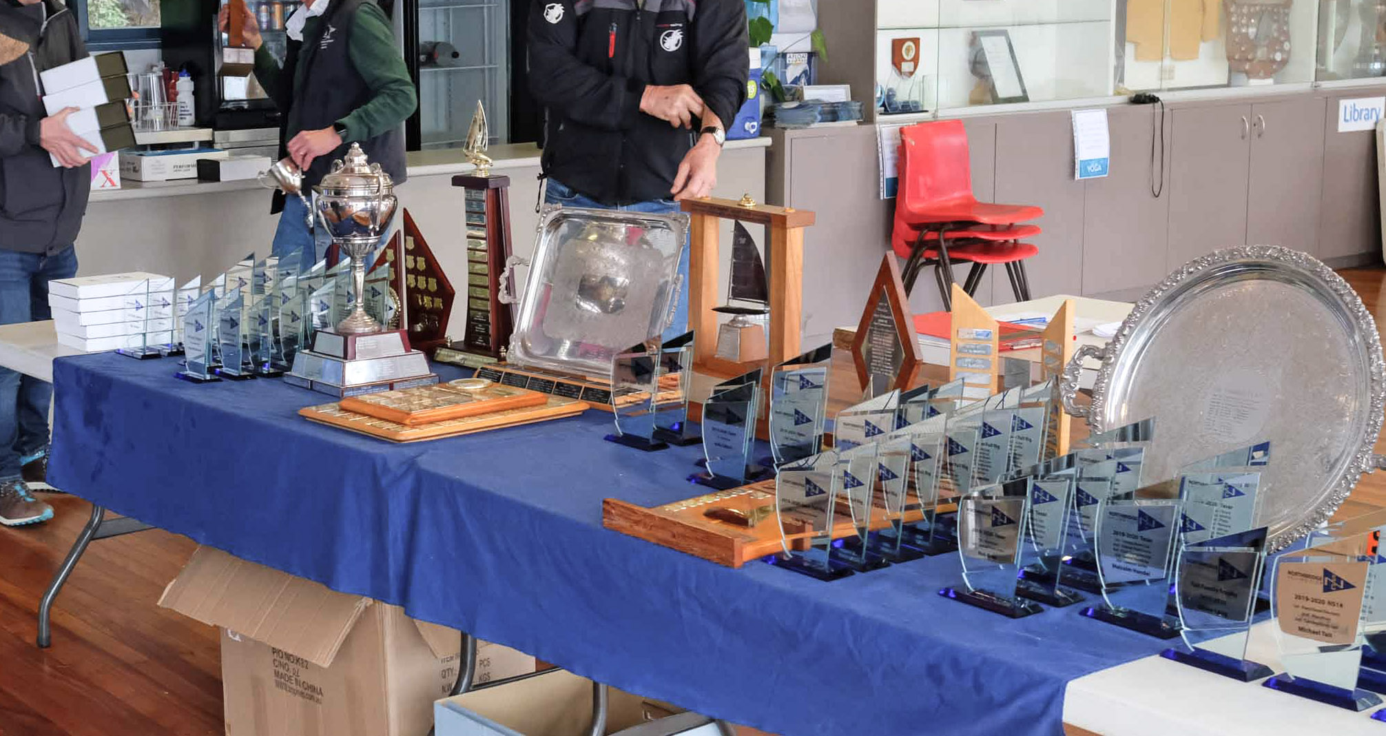 Glass Trophies and Awards on a presentation Table for a Sailing Club