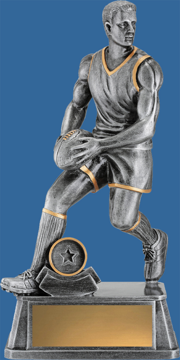 The trophy depicts a male setting to drop-punt the football. The trophy is beautifully designed and depicts an athletic study of a strong male player. The colours are antique silver and bronze trim.Australian Rules trophies. Maverick action trophy range. The ideal trophy for your top male or female player. 6 sizes in this dynamic range.