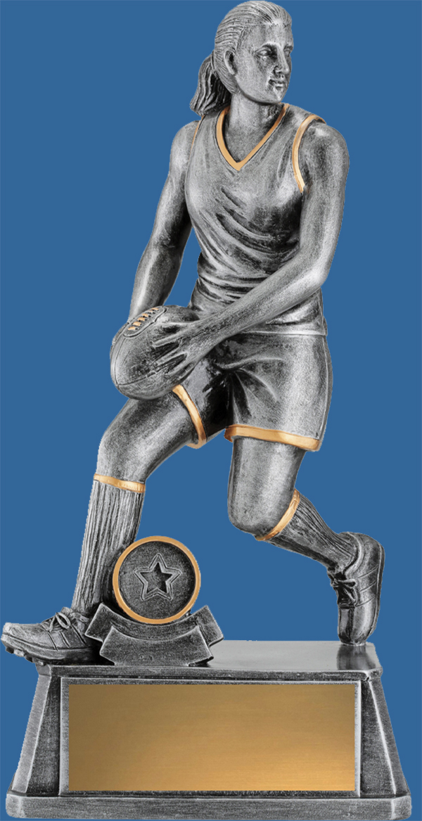 Tall athletic female Aussie Rules Trophy. Statue figurine style featuring a player preparing to kick the ball. The ideal trophy for your top male or female player. 6 sizes in this dynamic range